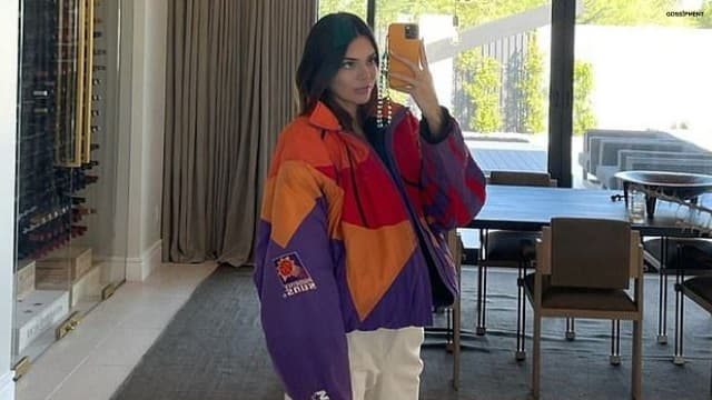 kendall wearing a Suns team jacket